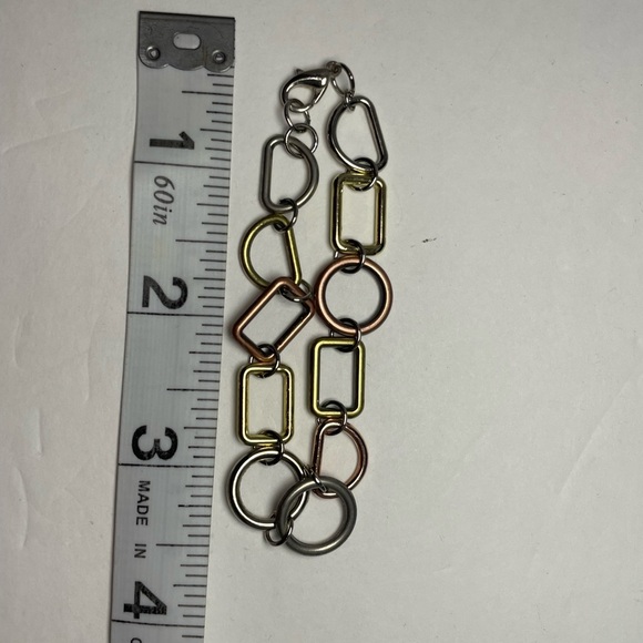 Tri-tone Geometric Bracelet in gold, silver, and copper tones. - Picture 3 of 4